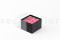 An elegant black box filled with preserved pink roses